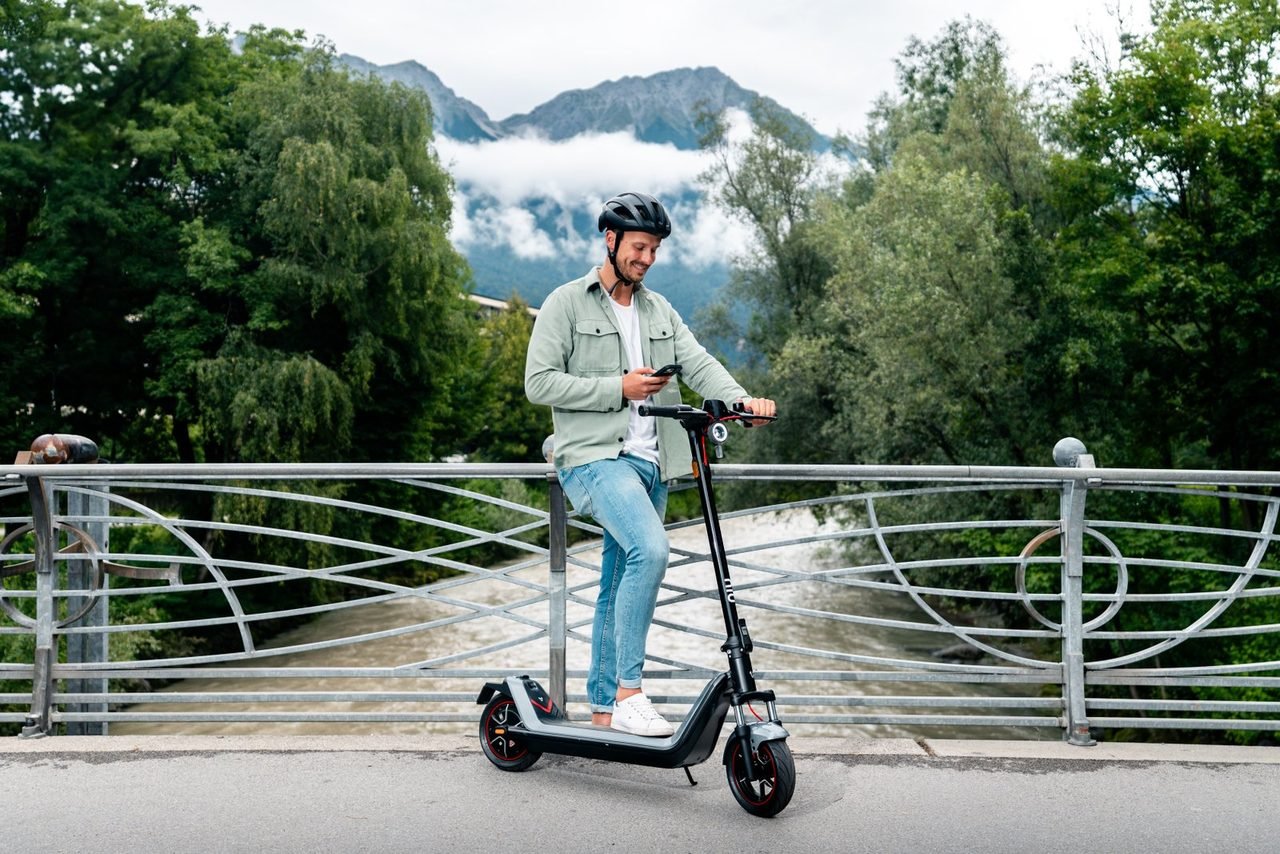 Riders on NIU KQi200 scooters in Miami